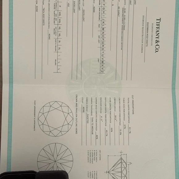 Tiffany & Co Diamond Engagement Ring .83Ct G/ VS2 Round, set in Platinum - Picture 6 of 6